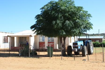 namibia epukiro 3 - most people park their family car under a tree.jpg
